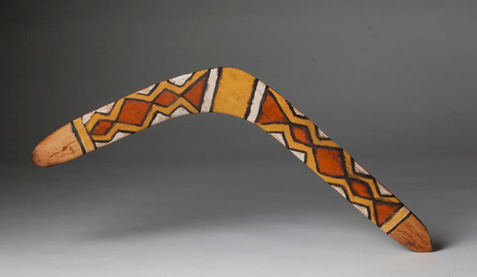 authentic aboriginal boomerang painted with aboriginal symbols