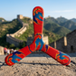 Boomerang Dragons tripale rouge, motifs dragons chinois bleu orange et or, sur la Grande Muraille de Chine